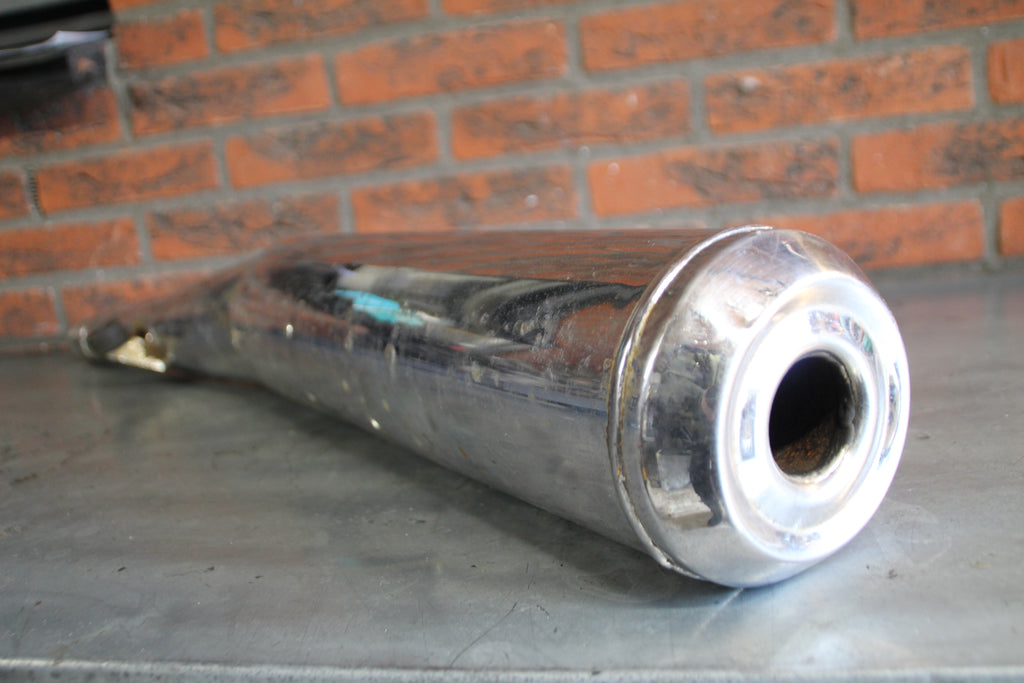 Triumph Trident uitlaat demper links